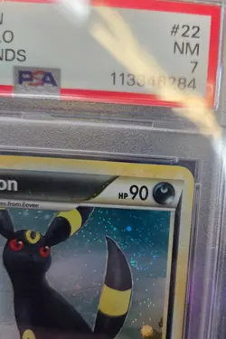 2011 POKEMON CALL OF LEGENDS UMBREON #22 HOLO PSA 7 NM #113346284 (SWIRL) - Image 3