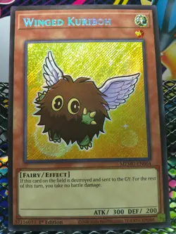 Winged Kuriboh MZMU-EN064 Secret Rare 1st Edition NM Yu-Gi-Oh! - Image 1