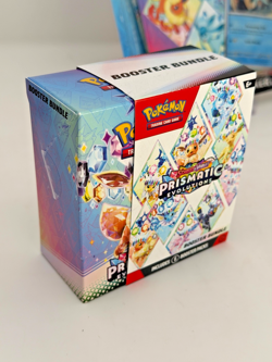 Pokemon Prismatic Evolutions Booster Bundle + Tech Sticker Bundle (Sealed Packs) - Image 4