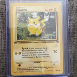Pikachu GOLD W STAMP Pokemon Card Jungle 1st Edition 60/64 - Image 1