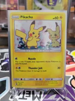 Pokemon TCG Pikachu SM162 Holo-Black Star Promo Card - Image 1
