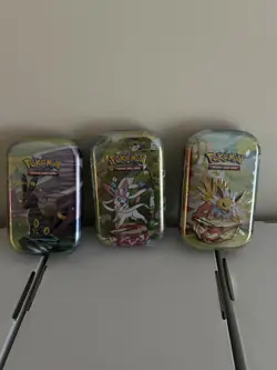 Pokemon TCG / Prismatic Evolutions Mini Tin - Image 1