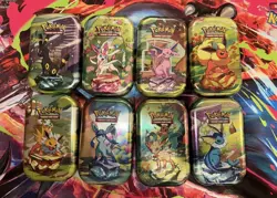 Pokemon Scarlet & Violet Prismatic Evolutions Mini Tin SET OF 8-NEW/SHIPS TODAY - Image 1