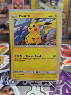 Pokemon TCG Pikachu SM206 Black Star Promo Cosmos Holo Sun & Moon Card - Image 1