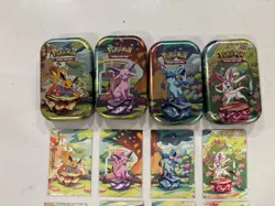 Pokemon Prismatic Evolutions Eevee Art Cards, Tins, And Coins - Image 3
