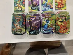 Pokemon Prismatic Evolutions Eevee Art Cards, Tins, And Coins - Image 4