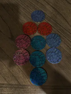 Pokemon TCG Lot 10 Prismatic Evolutions Coins - Image 1