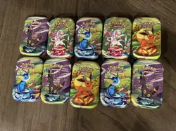Pokemon TCG Prismatic Evolution Tin Lot of 10 - Image 1