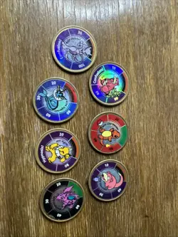 Vintage Pokemon Battle Coins 1999 Lot of 7 Metal Pogs Nintendo & Hasbro - Image 1