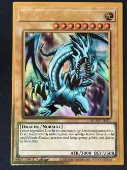 Blauaugiger W. Drache MGED-DE001 Gold Rare Deutsch NM YUGIOH - Image 1