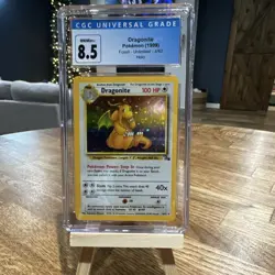 Pokemon TCG Fossil Unlimited Dragonite Holo Rare 4/62 CGC 8.5 1999 - Image 1