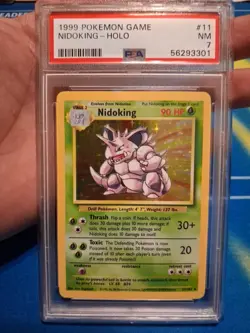 1999 Pokemon Base Set Unlimited Nidoking Rare Holo Card #11/102 PSA 7 NM - Image 1