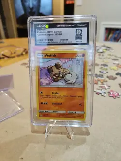 2019 Pokemon Rockruff Cosmic Eclipse German - Image 1