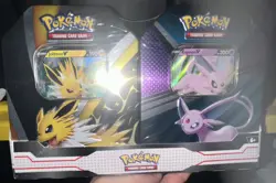POKEMON NEW & FACTORY SEALED 2023 - JOLTEON V & ESPEON V - V HEROES TIN - 2 PACK - Image 1