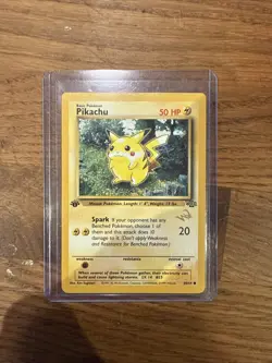 1999 Pokemon Jungle 1st Edition Pikachu W Stamp - Image 1