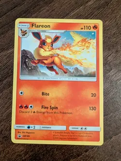 Flareon SM186 Ultra Rare Non Holo Black Star Promo Pokemon Card Near Mint - Image 1