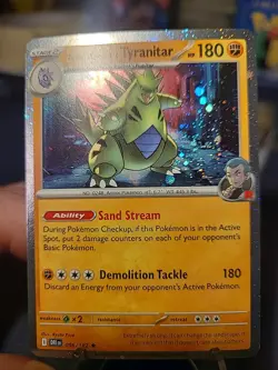 Team Rocket's Tyranitar 096 Pokemon Destined Rivals Cosmos Holo SWIRL Promo Card - Image 1