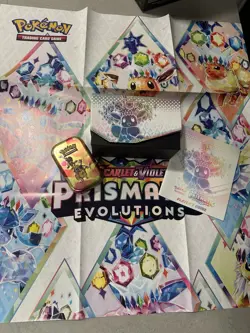 Prismatic Evolutions Pokemon Lot With Cards, Poster, Tin, ETB Box & Player Guide - Image 1