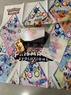Prismatic Evolutions Pokemon Lot With Cards, Poster, Tin, ETB Box & Player Guide - Image 2