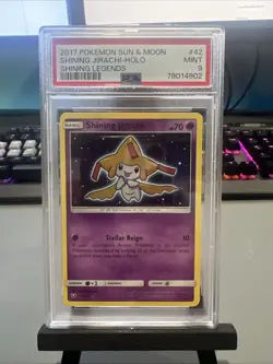 2017 POKEMON SUN & MOON SHINING LEGENDS #42/73 JIRACHI HOLO PSA 9 - Image 1