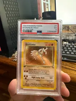 1999 Pokemon TCG Hitmonlee 7/62 Fossil-1st Edition Holo PSA 5 - Image 1