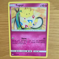 TOGEPI 136/214 POKEMON CARD (UNBROKEN BONDS SET) - Image 1