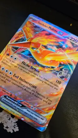 Team Rocket's Moltres ex 31/182 Full-Art Pokemon card - Image 1