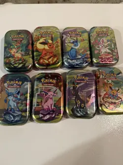 Pokemon TCG Prismatic Evolutions Lot of 8 Sealed Mini Tins All Artwork New - Image 1