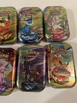 Pokemon TCG Prismatic Evolutions Lot of 8 Sealed Mini Tins All Artwork New - Image 4