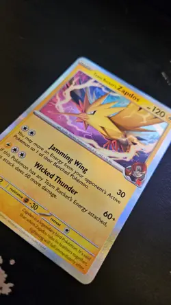 Team Rocket's Zapdos 70/182 Holographic Pokemon card - Image 1