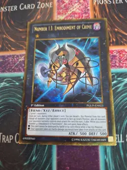 Yugioh Number 13: Embodiment of Crime PGLD-EN023 Gold Secret Rare 1st Edition NM - Image 1