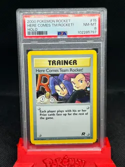 Here Comes Team Rocket trainer holo PSA 8 MINT Team Rocket set Pokemon card WOTC - Image 1
