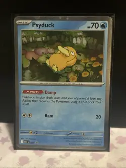 Psyduck (Cosmos Holo) Mega Evolution Promo SVP 007 Pokemon Card NM - Image 1