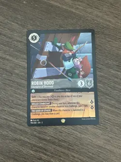 Into the Inklands Disney Lorcana TCG Robin Hood (foil) Champion of Sherwood - Image 1