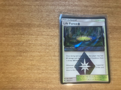 Trainer Life Forest 180/214 Lost Thunder Pokemon Card Prism Star Holo 2018 NM - Image 1