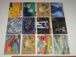 12 Topps 1999 Pokemon trading cards. 1 chrome, 1 die cut & a trainer - Image 1