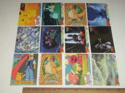 12 Topps 1999 Pokemon trading cards. 1 chrome, 1 die cut & a trainer - Image 2