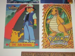 12 Topps 1999 Pokemon trading cards. 1 chrome, 1 die cut & a trainer - Image 5