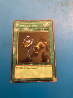 YUGIOH Super Rare Confiscation MRL-E038 1st Edition - Image 1