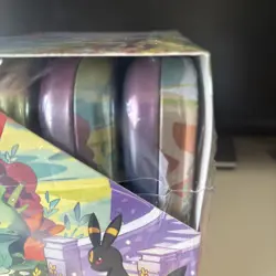 Pokemon Prismatic Evolutions Mini Tin Display Box (8 Tins) * NEW SEALED * (tear) - Image 4