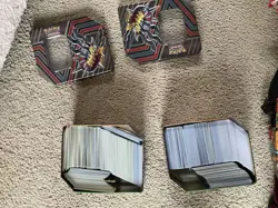 Pokemon Cards Bulk - 2 tins of cards - holos/energies/reverse holos/regular - Image 1
