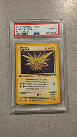 PSA 8 Pokemon 1999 1st Edition Fossil Zapdos Holo #15 - Image 1