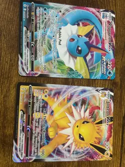 pokemon card holo lot Vaporeon Vmax and Jolteon Vmax - Image 1