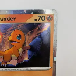 Charmander 047 Cosmos Holo SV: Scarlet & Violet Promo Pokemon Card - Image 3