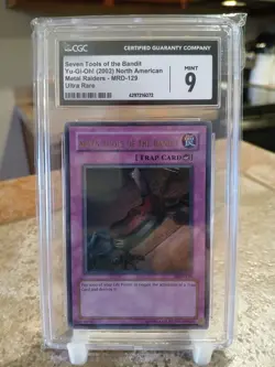 Yugioh TCG Seven Tools of the Bandit CGC 9 1st Ed MRD-129 (Some Case Scratching) - Image 1