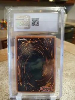 Yugioh TCG Seven Tools of the Bandit CGC 9 1st Ed MRD-129 (Some Case Scratching) - Image 2