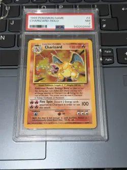 1999 Pokemon Base Set Charizard Holo 4/102 PSA 7 NM - Image 1