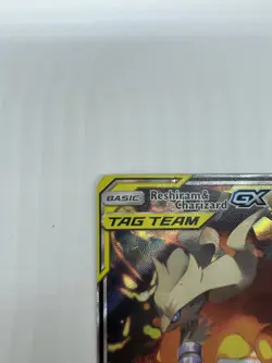 Pokemon Reshiram & Charizard GX Tag Team SM201 Black Star Promo - Image 4