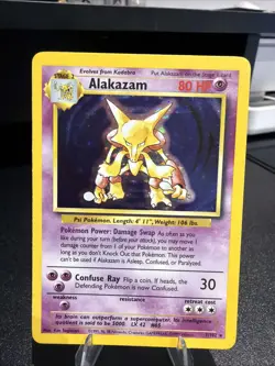 Pokemon TCG Alakazam Holo Card Base Set 1/102 WOTC 1999 - Image 1