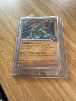 Team Rocket's Tyranitar 096/182, Destined Rivals Pokemon Center Stamp - Sealed - Image 1
